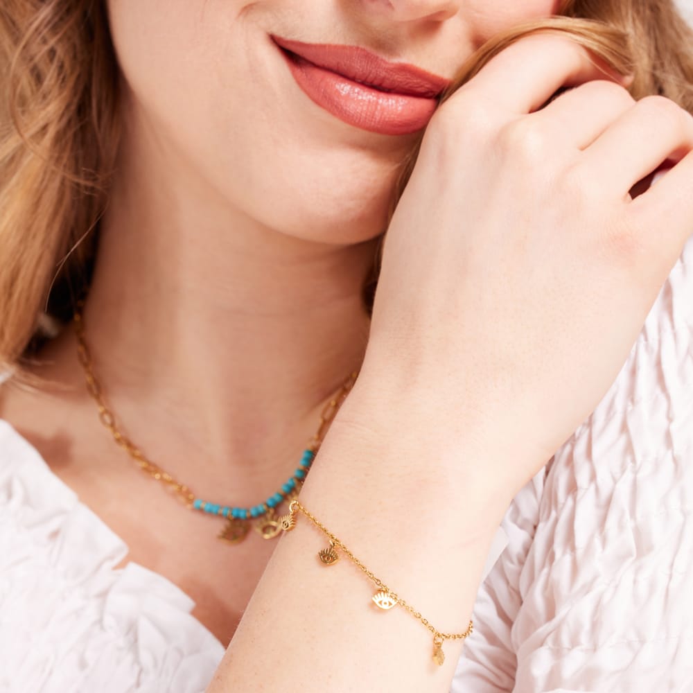 Stalen goldplated armband met hanger oogjes