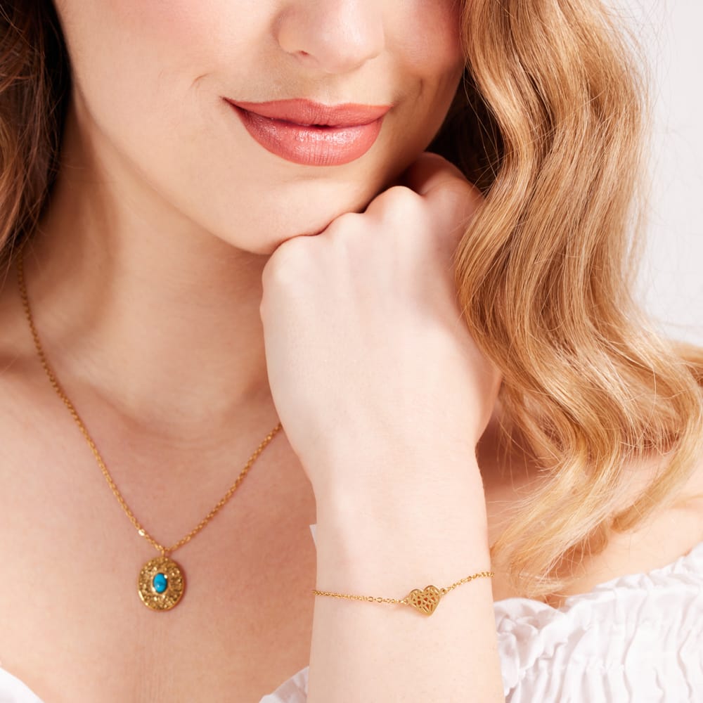 Stalen goldplated armband met hanger hart