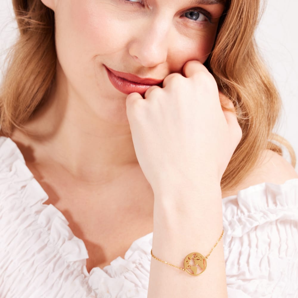 Stalen goldplated armband wereldbol
