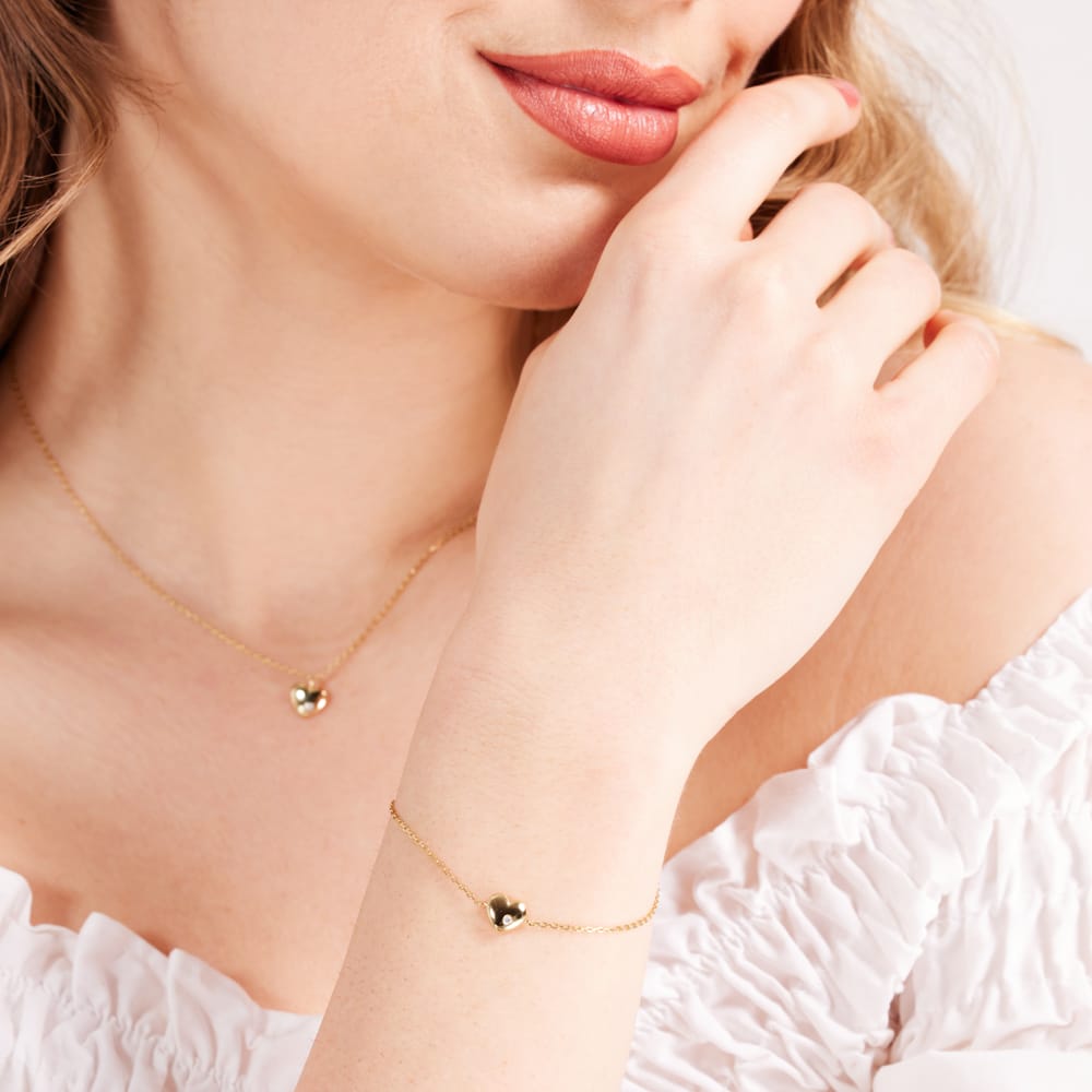 Zilveren goldplated bedelarmband hartje met zirkonia voor dames
