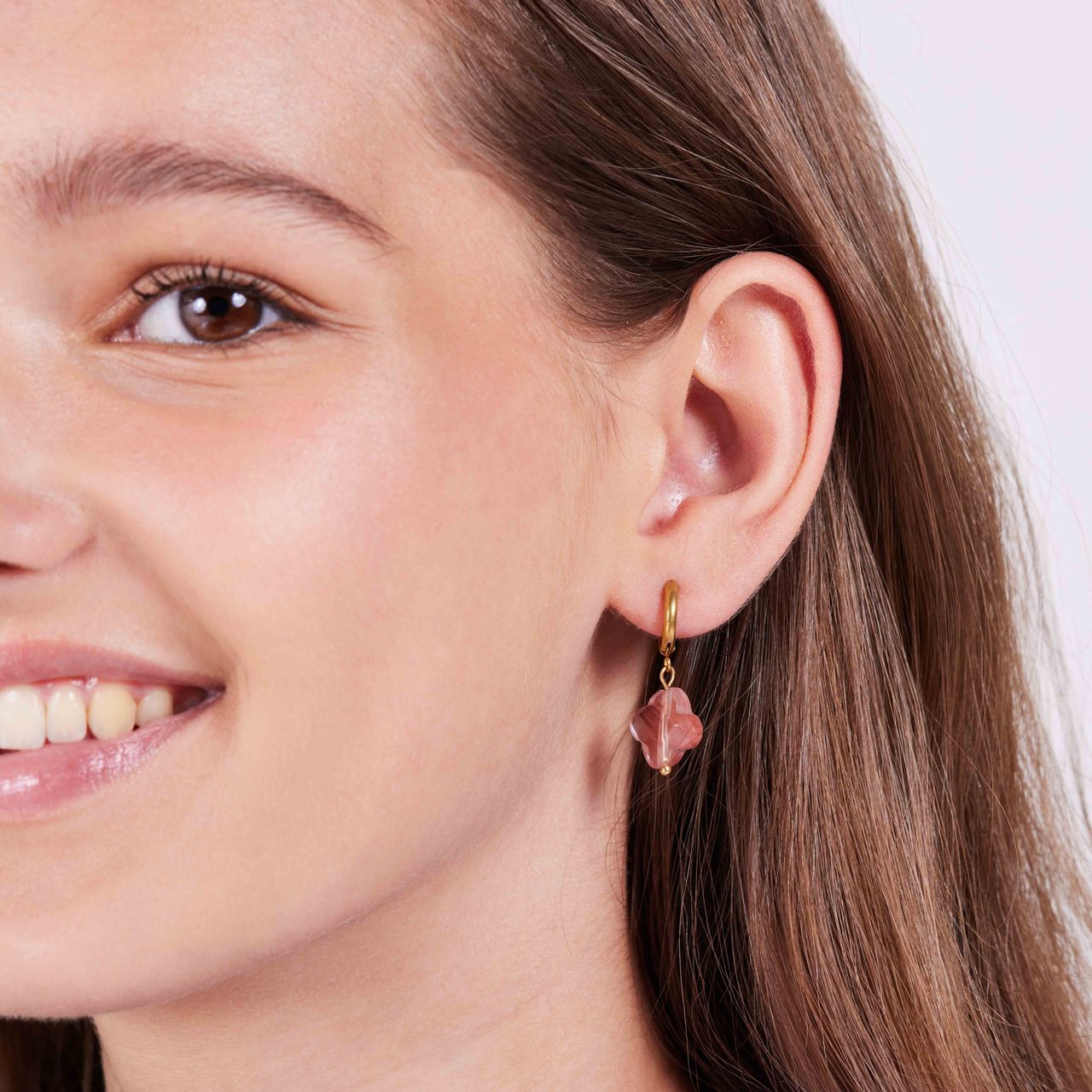 Stainless steel goldplated oorringen met hanger bloem met rhodoniet voor dames