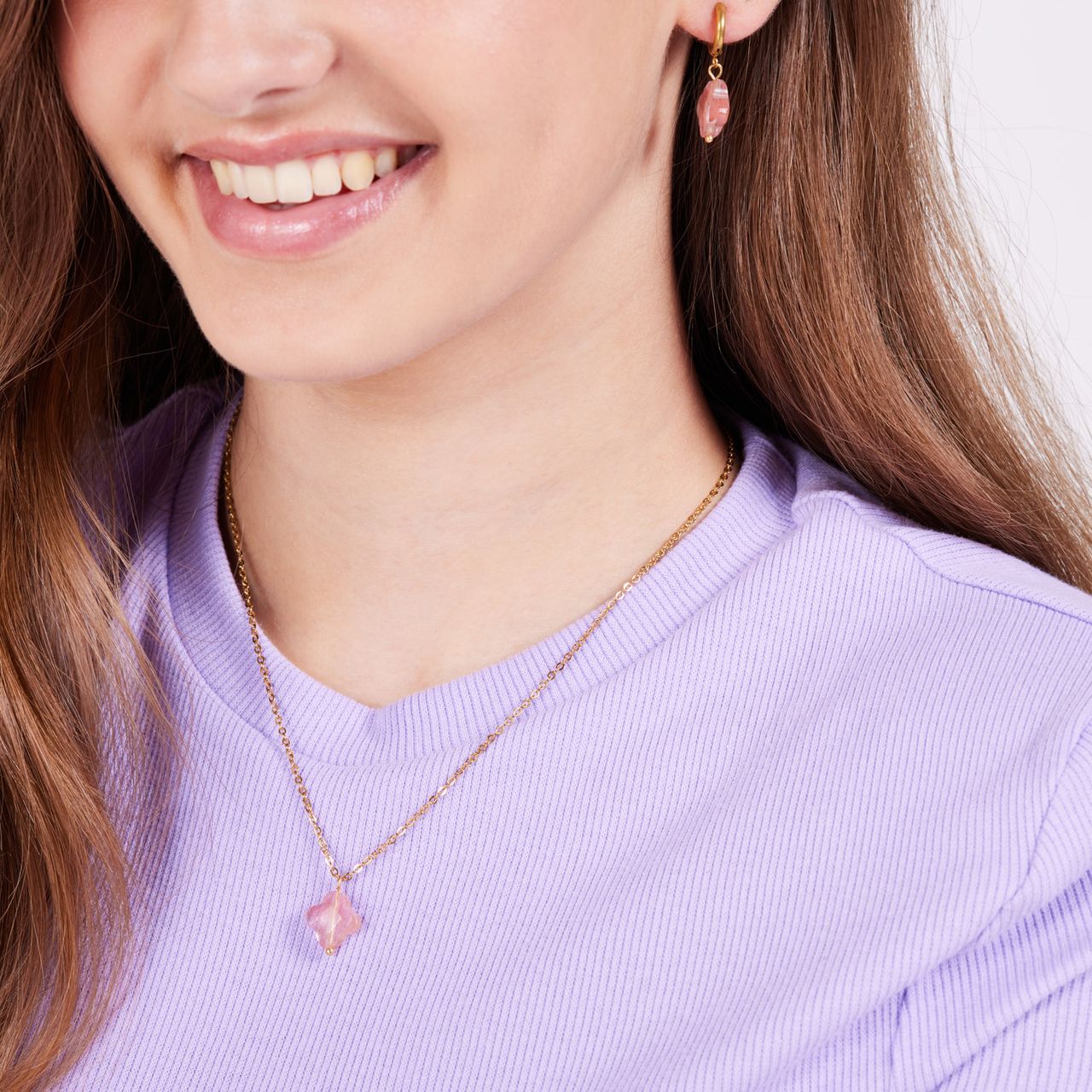 Stalen goldplated ketting met hanger bloem met rhodoniet voor dames