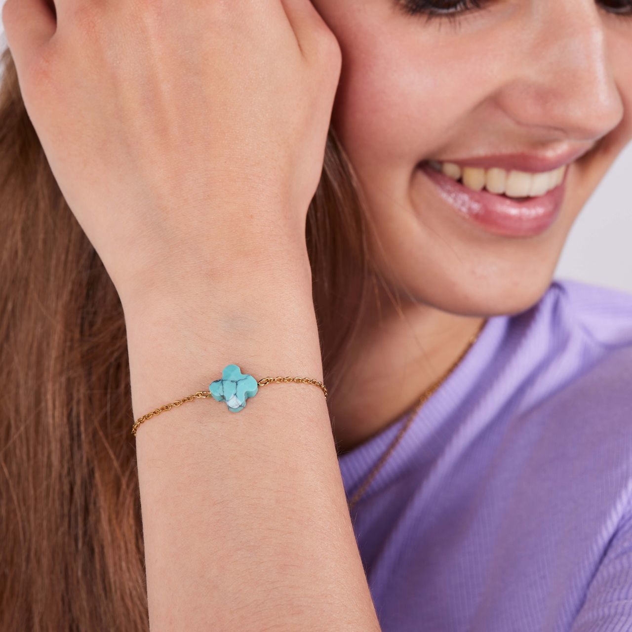 Stainless steel goldplated fantasiearmband met hanger bloem met turquoise voor dames