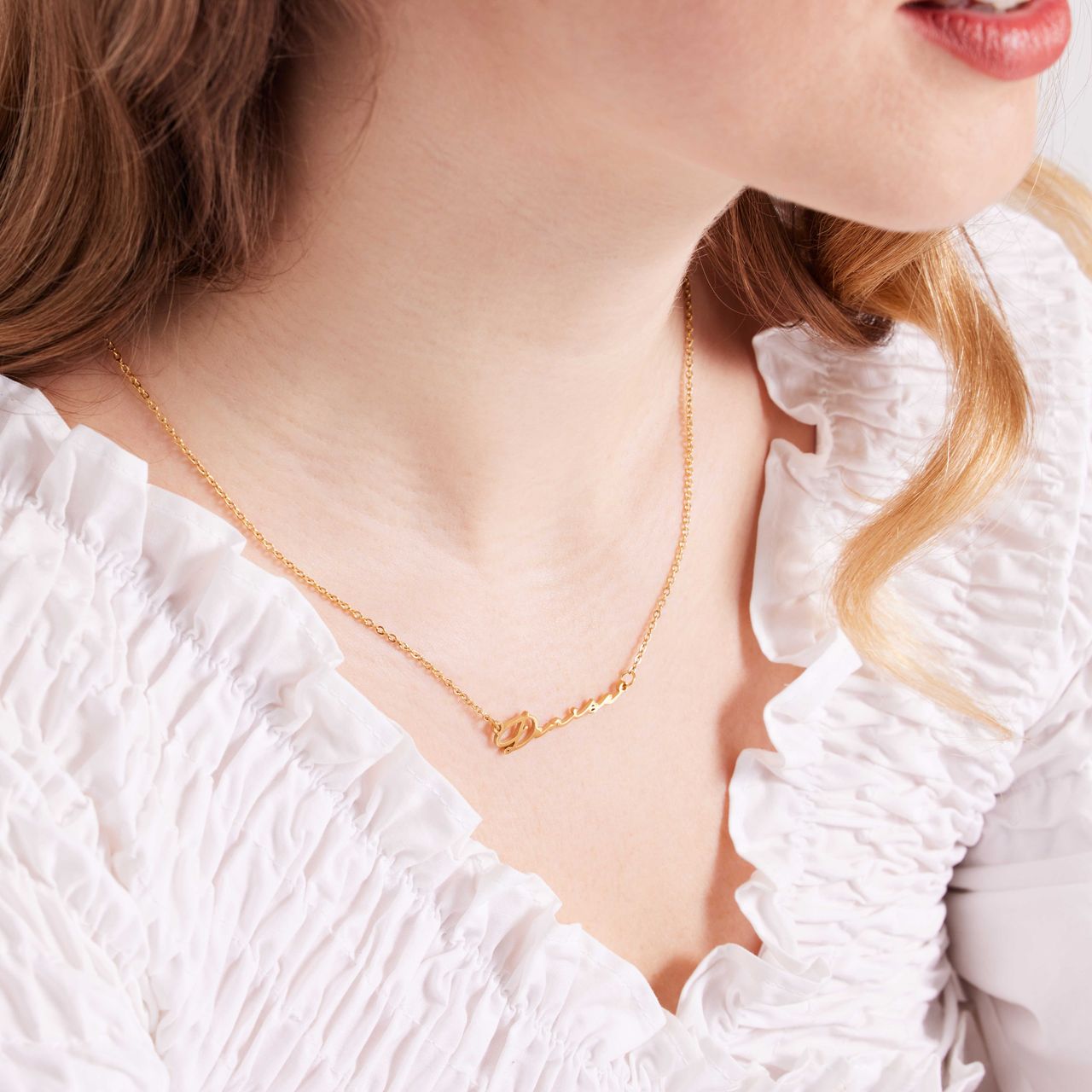Stainless steel naamketting goldplated signature voor dames