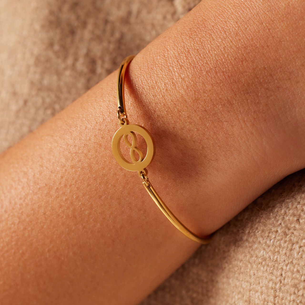 Stainless steel goldplated fantasiearmband met hanger voor dames