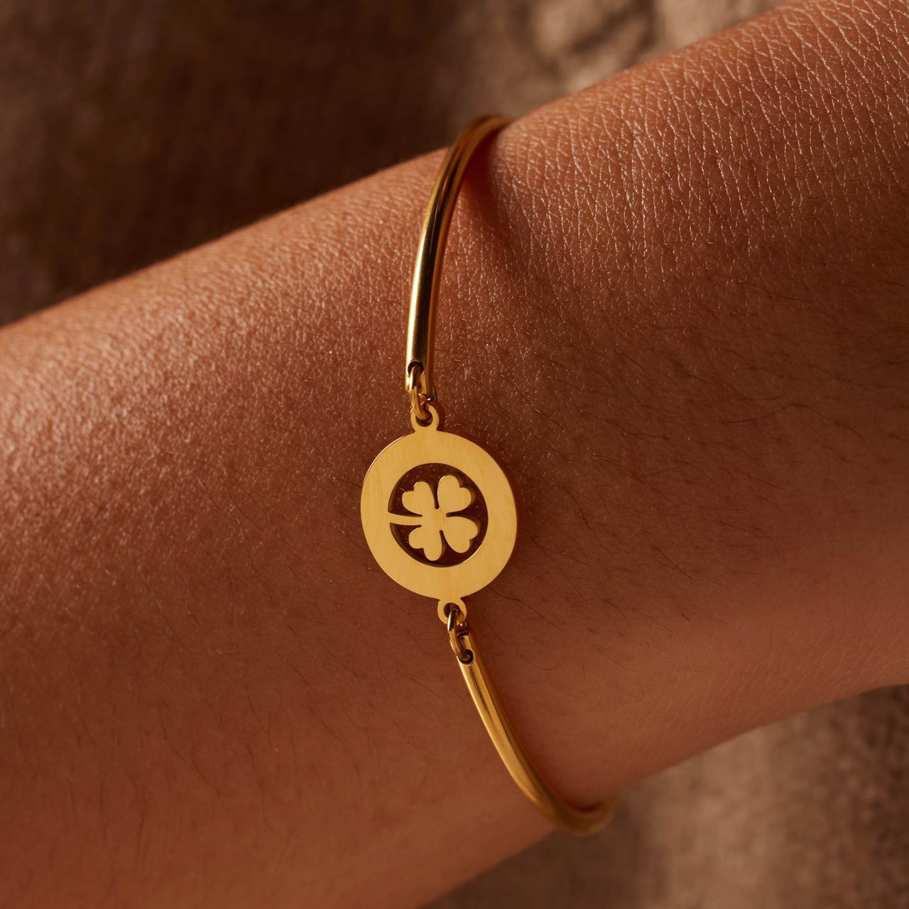 Stainless steel goldplated armband met open klaver