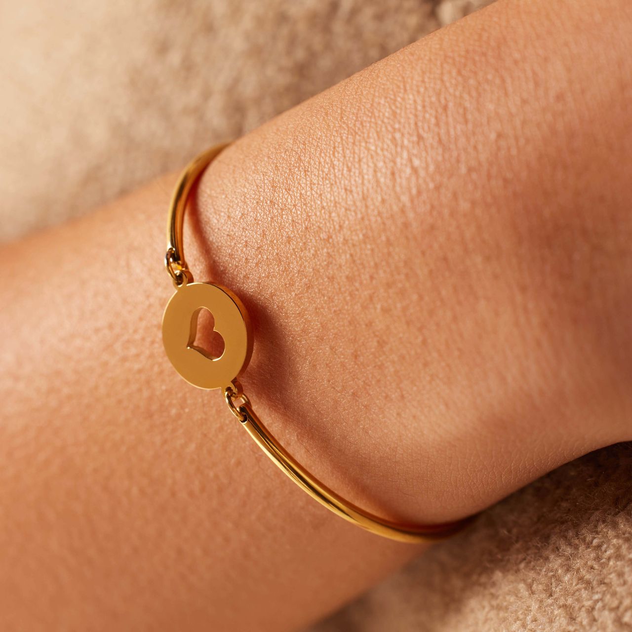 Stalen goldplated armband met open hart