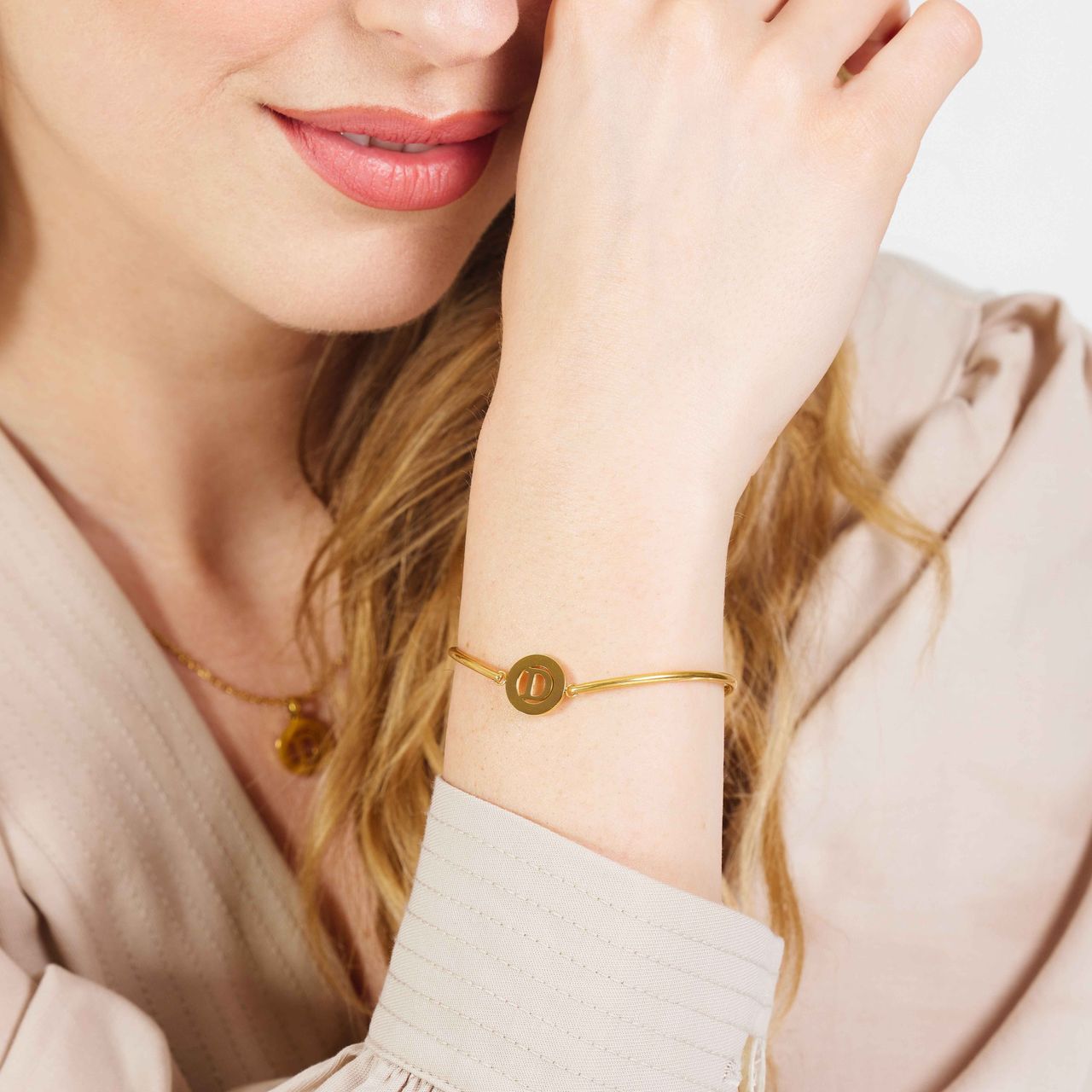 Stalen goldplated armband met letter - D