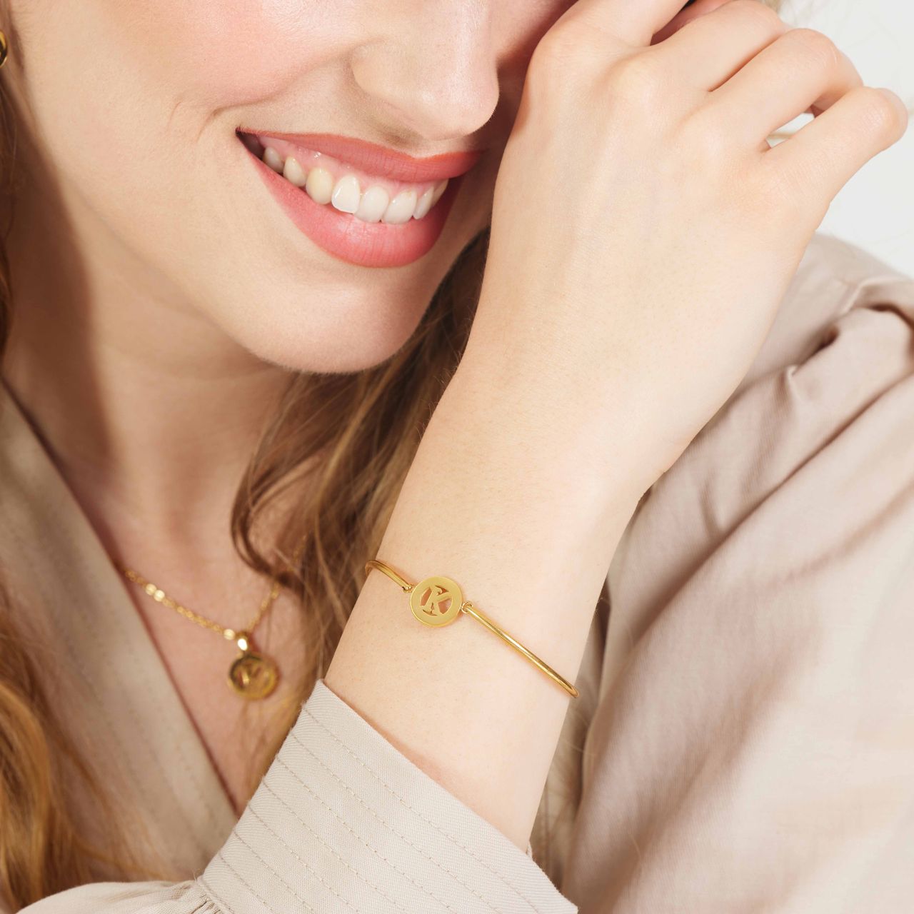 Stalen goldplated armband met letter - K