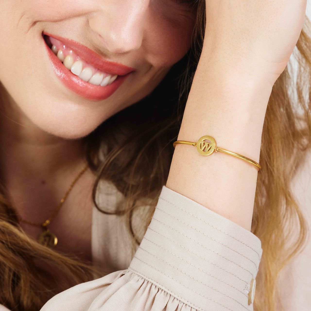 Stalen goldplated fantasiearmband met letterhanger W voor dames