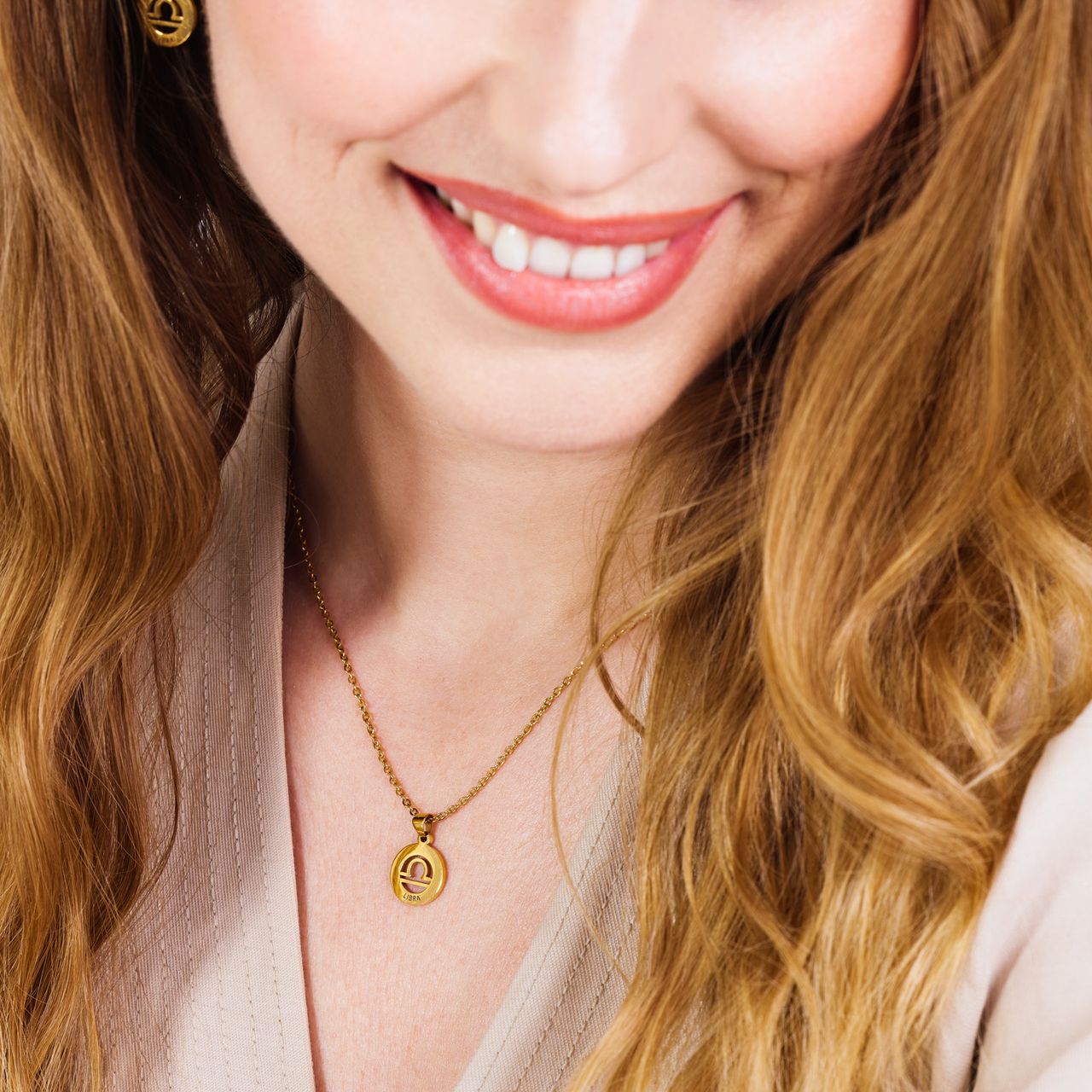 Stainless steel goldplated ketting met sterrenbeeld weegschaal