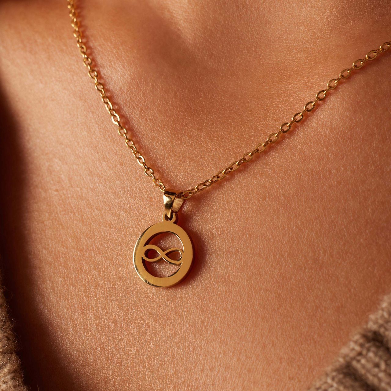 Stainless steel goldplated ketting met hanger open infinity