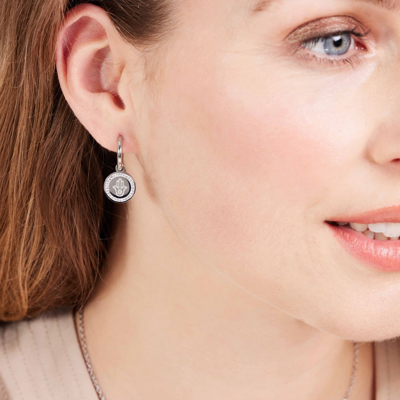 Stainless steel oorbellen met Hamsa