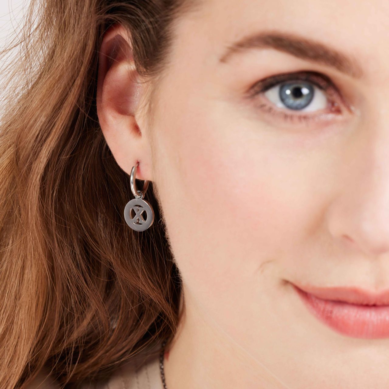Stainless steel oorbellen met letter - X