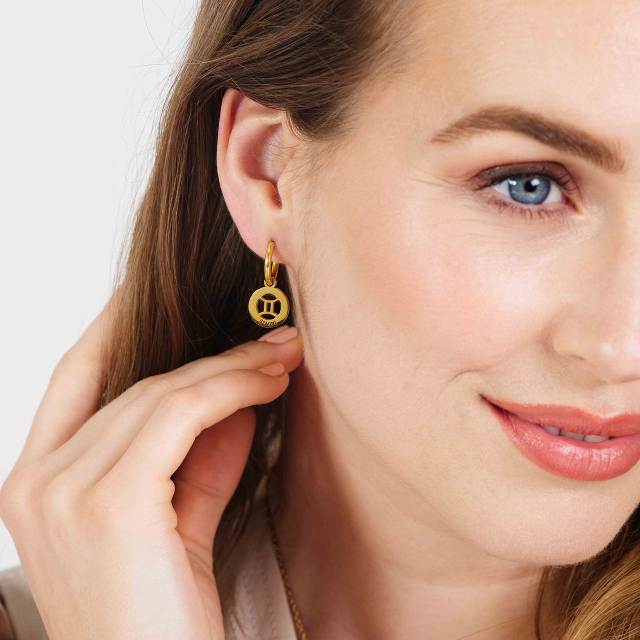 Stalen goldplated oorbellen met sterrenbeeld tweeling