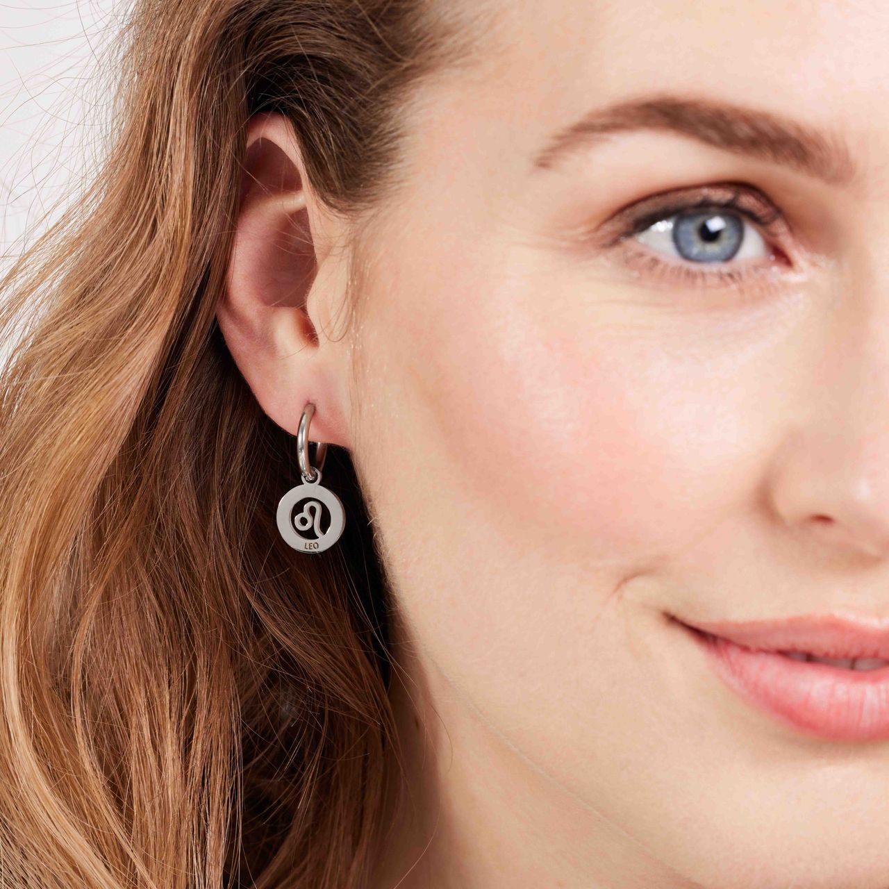 Stainless steel oorbellen met sterrenbeeld leeuw