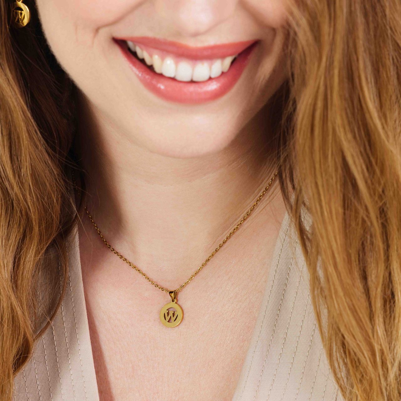 Stainless steel goldplated ketting met letterhanger W voor dames