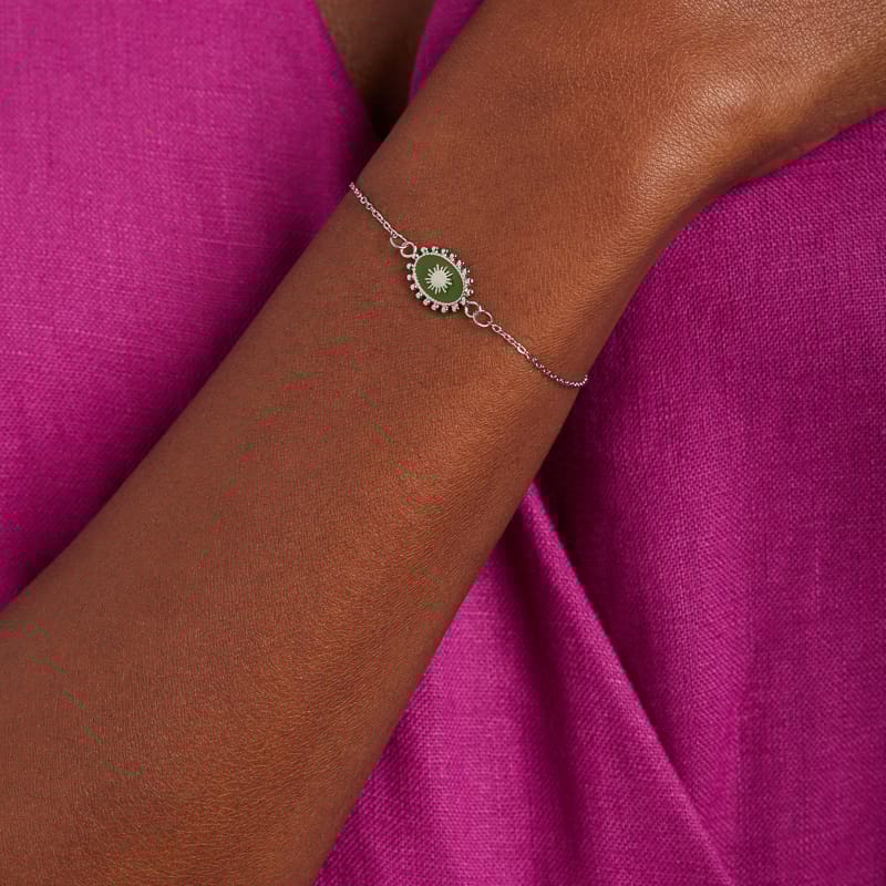 Stalen armband met groene ovale munt