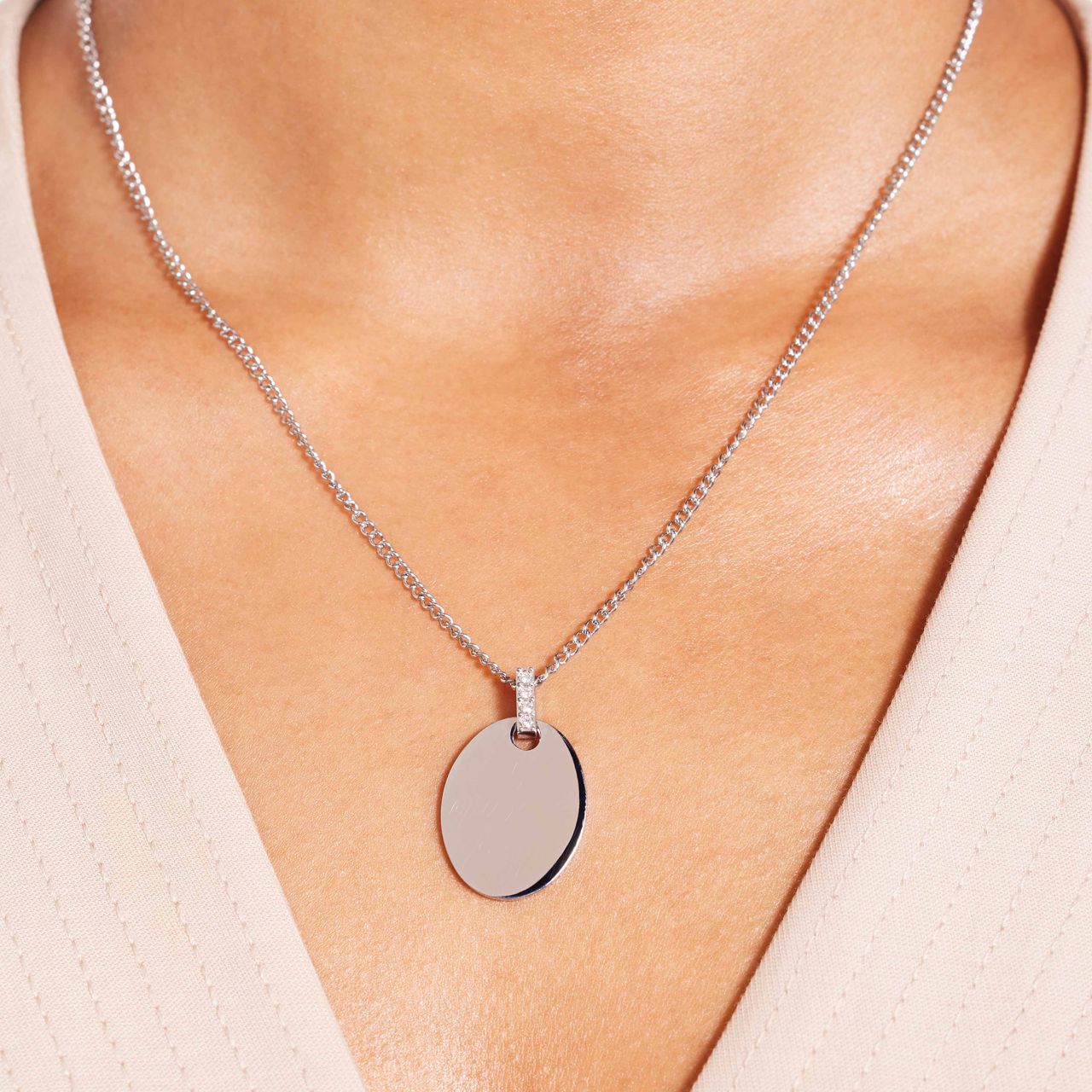 Gerecycled stainless steel ketting met munt hanger voor dames