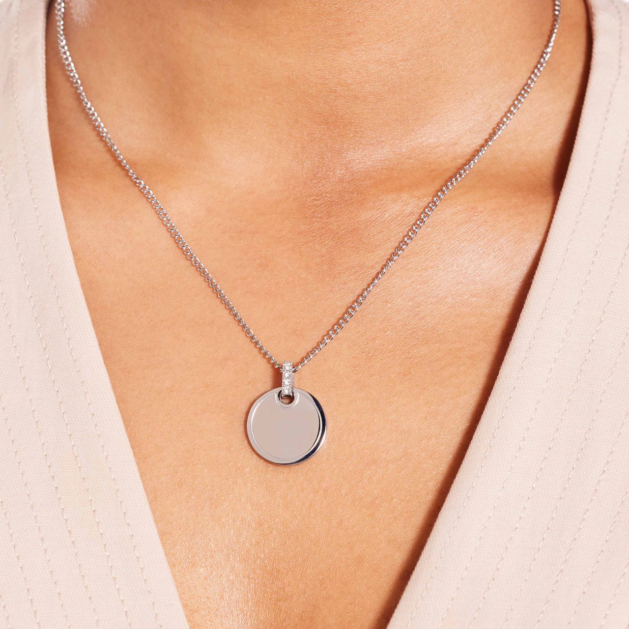 Gerecycled stainless steel ketting met bewerkte munt hanger voor dames