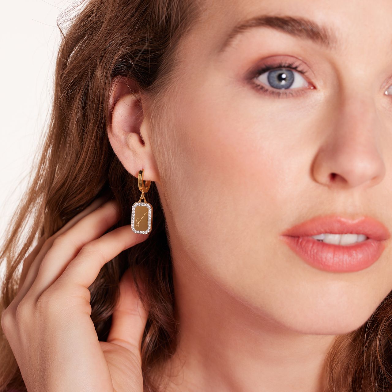 Guess stainless steel goldplated oorringen met hanger met kristal voor dames