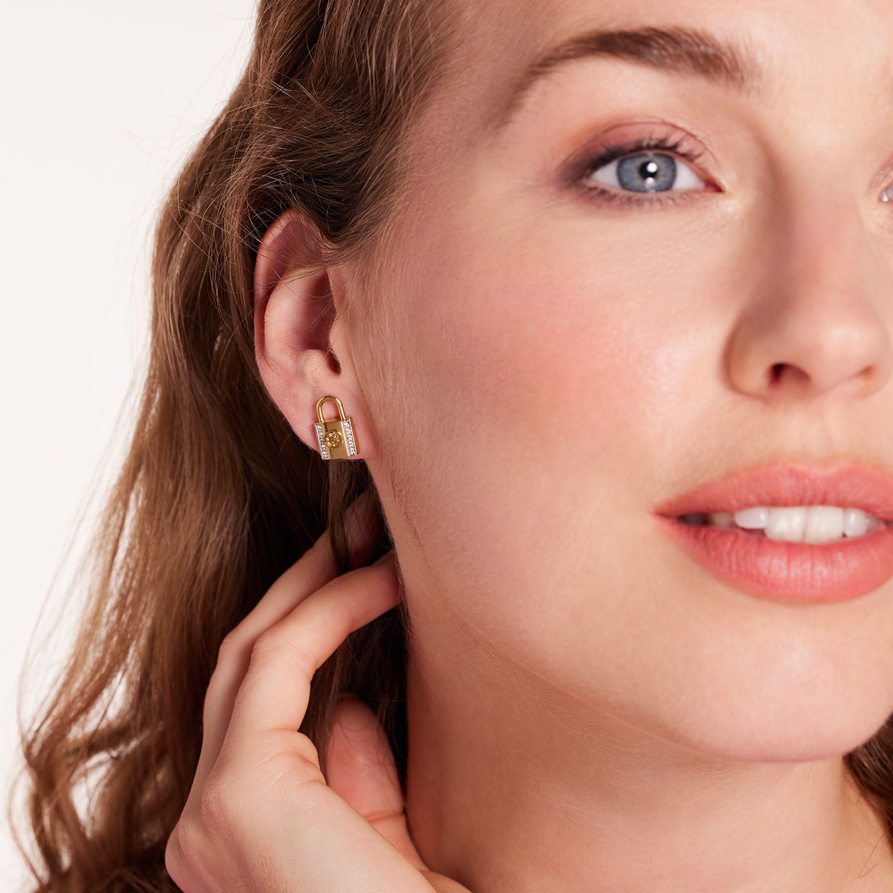 Guess stalen goldplated oorknoppen met kristal voor dames