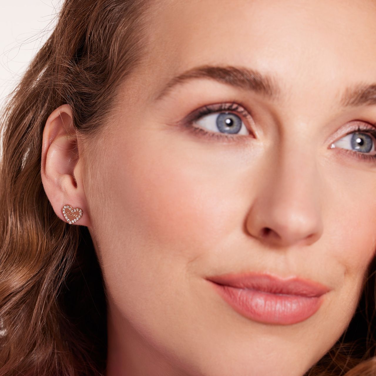 Guess stainless steel roséplated oorknoppen hart met kristal voor dames