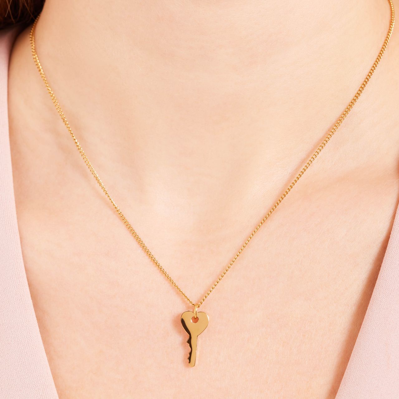 Stalen goldplated ketting met hanger sleutel