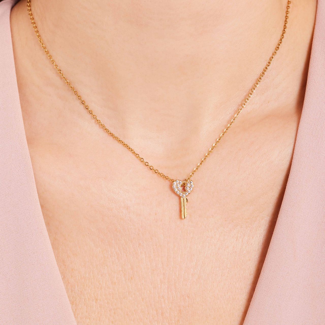 Stalen goldplated ketting met hanger sleutel zirkonia