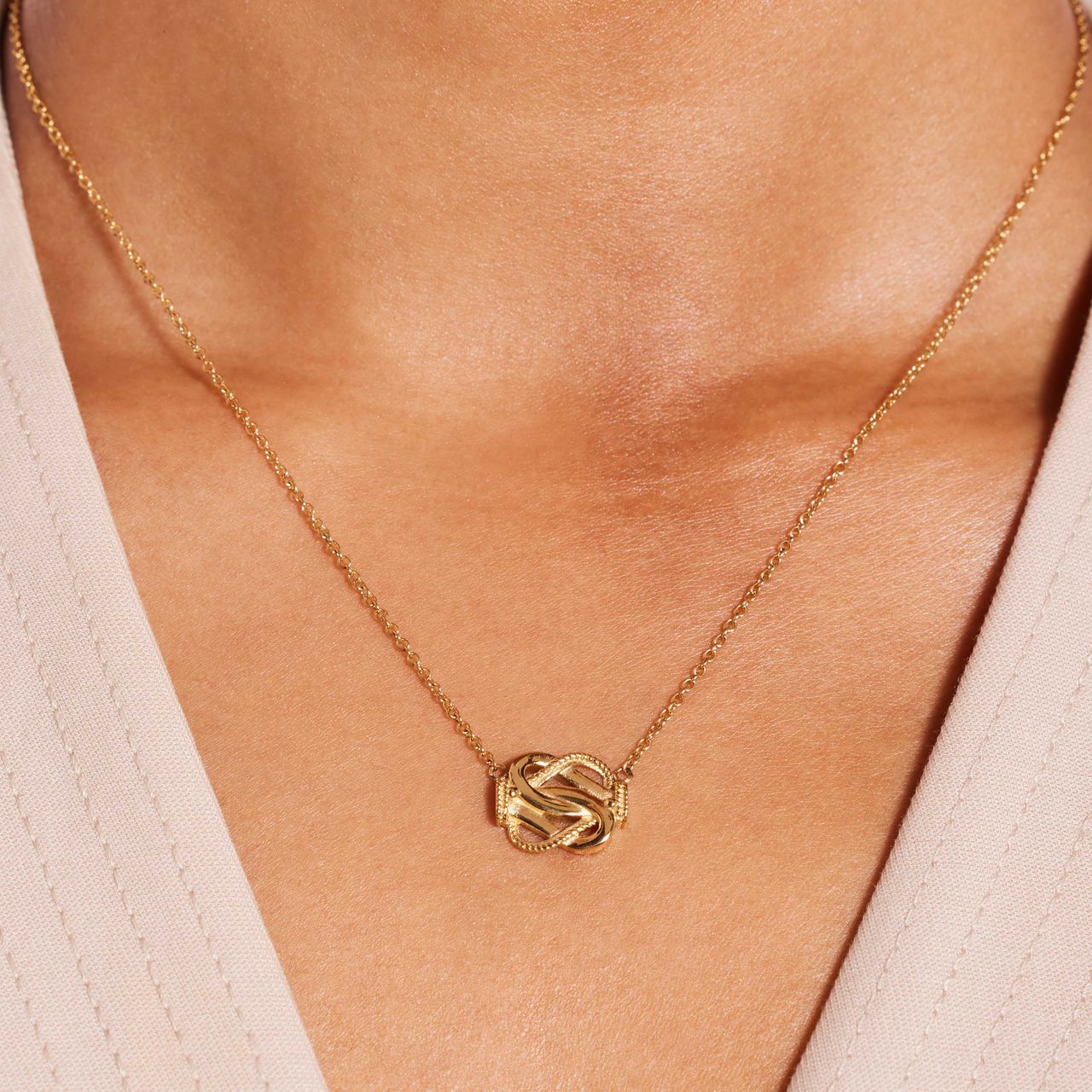 Goldplattierte Halskette aus recyceltem Edelstahl mit Teppichklopfer-Design