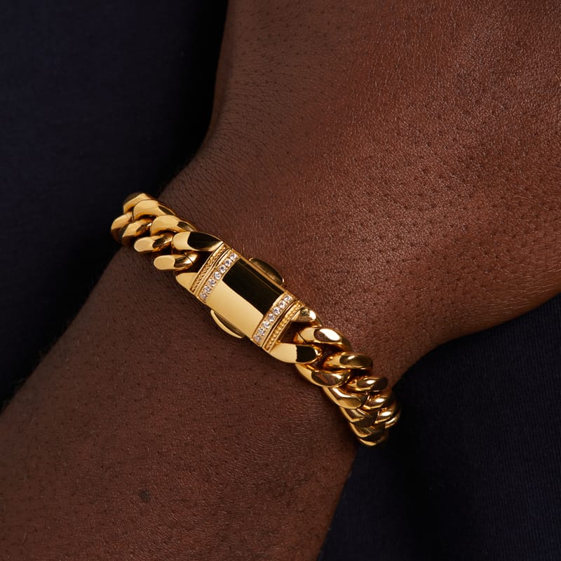 Stainless steel goldplated herenschakelarmband met zirkonia