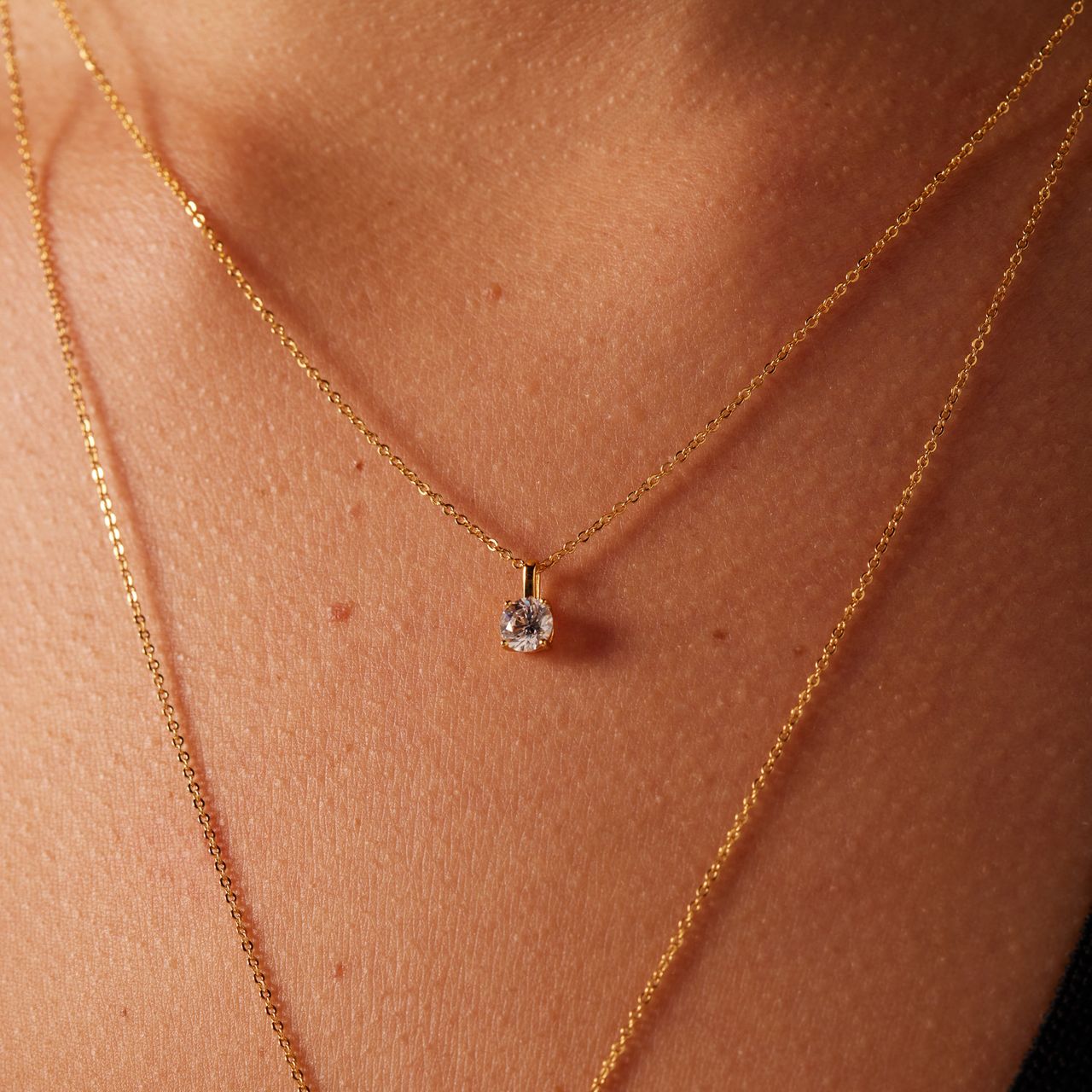 Zilveren goldplated ketting layering met zirkonia
