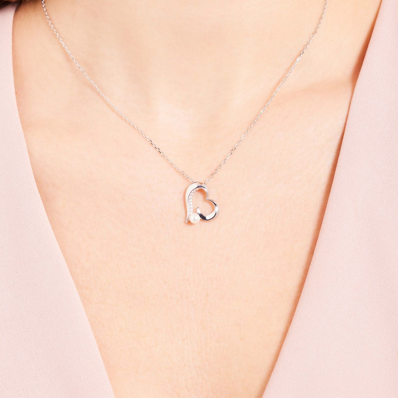 Zilveren ketting met hanger hart parel