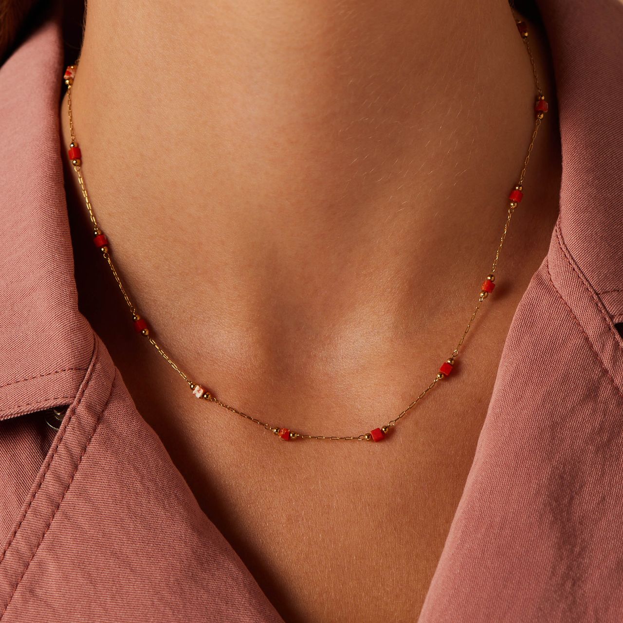 Stainless steel goldplated ketting met oranje blokjes