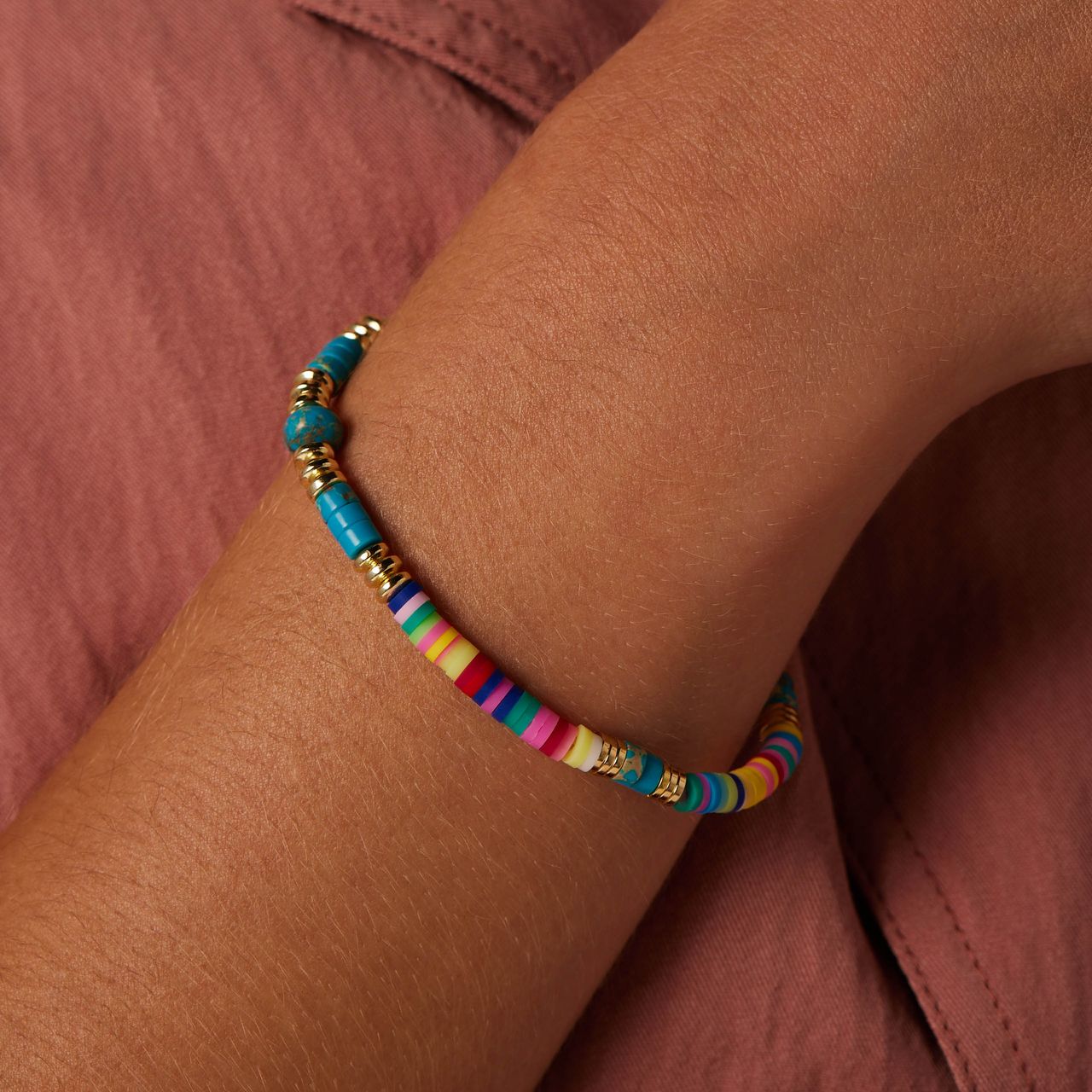 Stainless steel goldplated rekarmband blauwe kralen