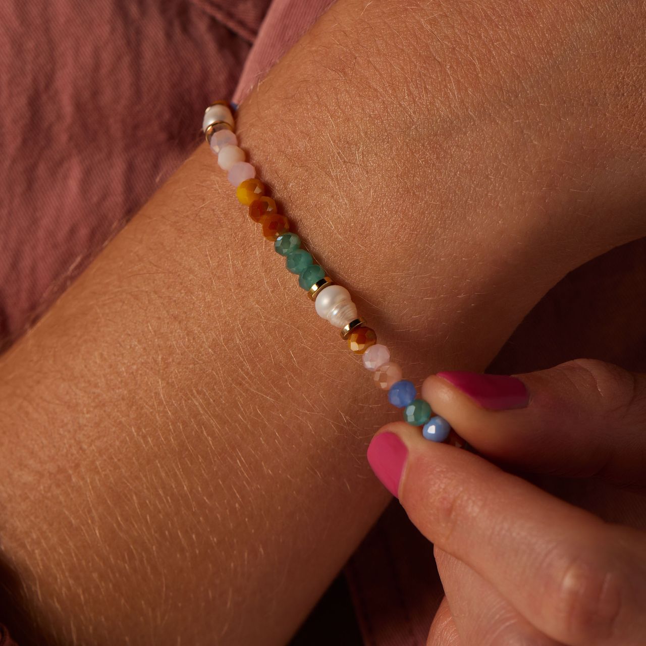 Stalen goldplated armband met parel en kralen