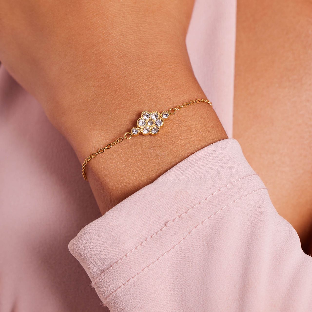 Stalen goldplated armband vintage bloem wit