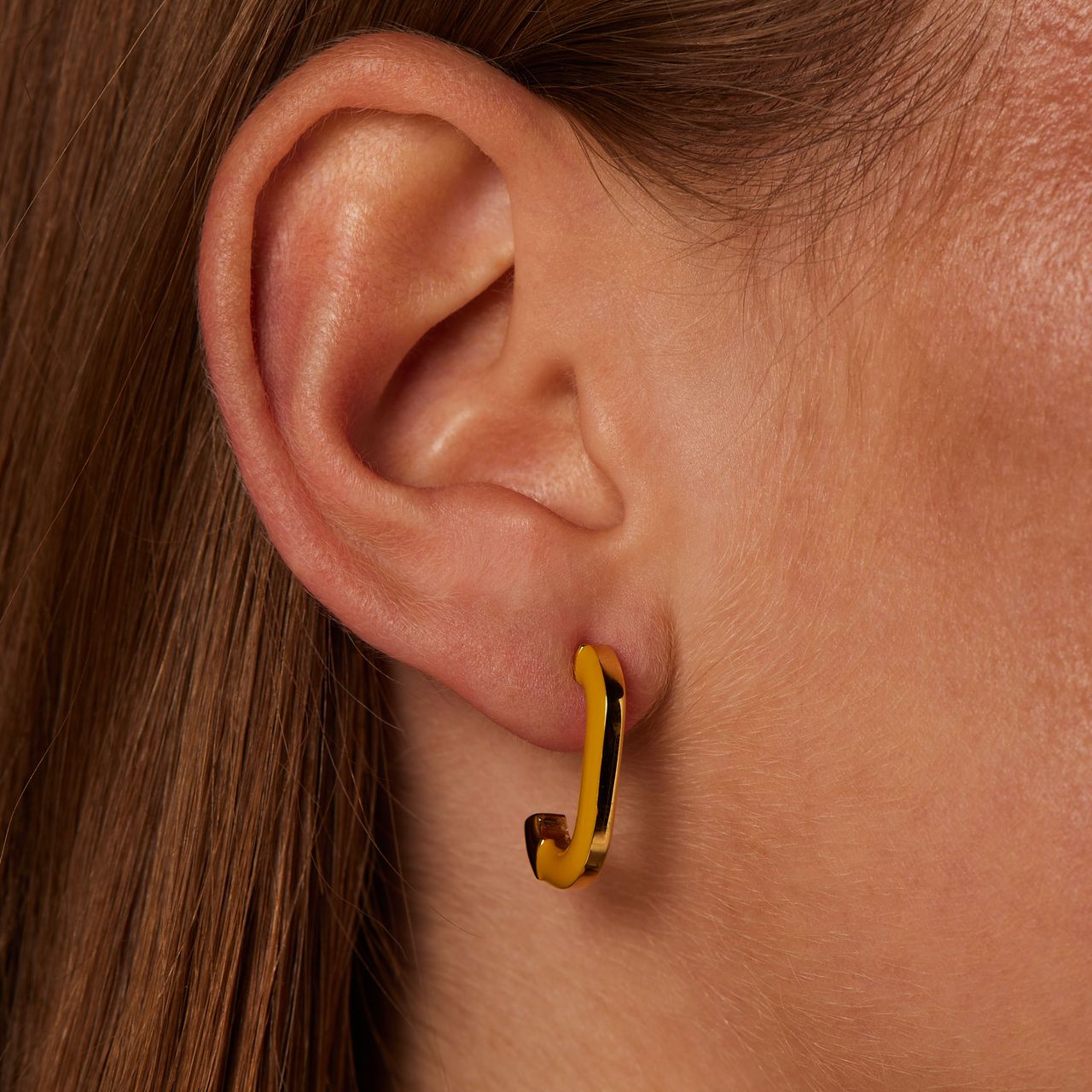 Stalen goldplated oorbellen geel half