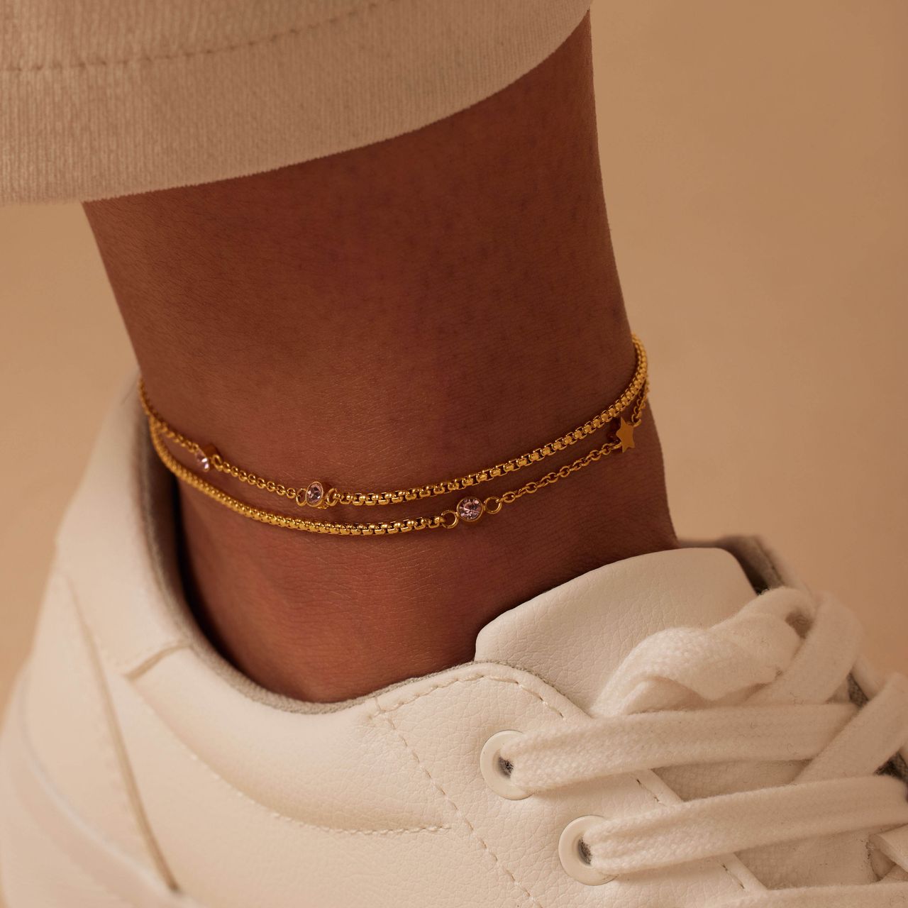 Dubbele goldplated stainless steel enkelbandje met steentje