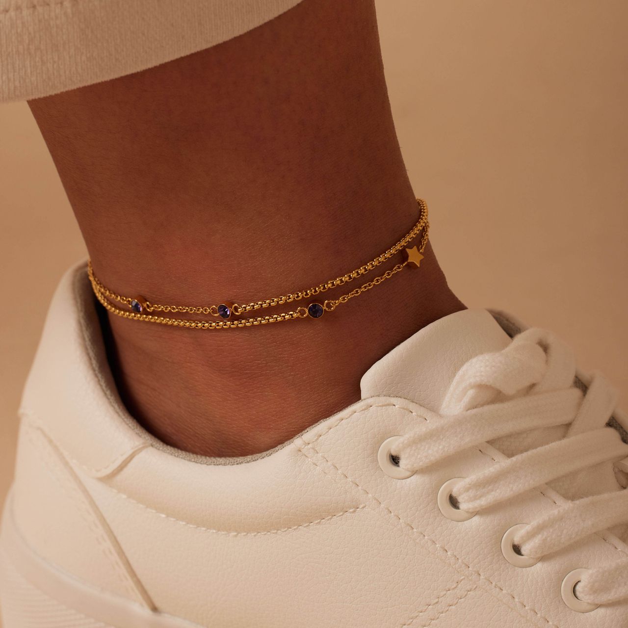 Dubbele goldplated stainless steel enkelbandje met steentje