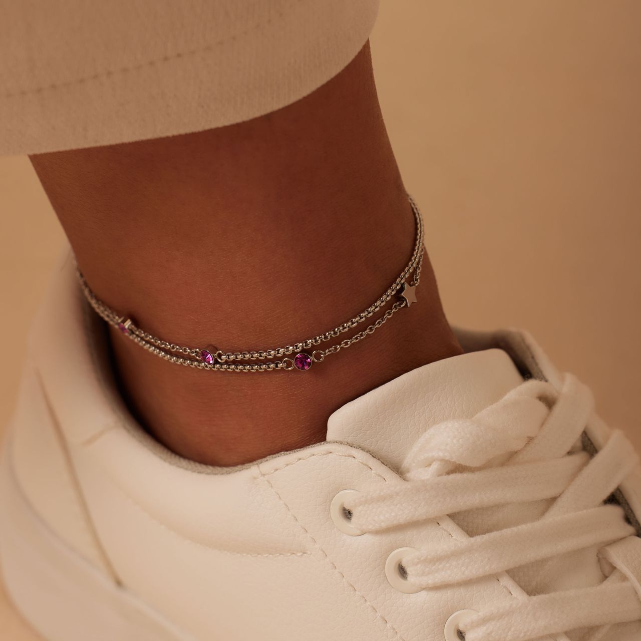 Dubbele stalen enkelbandje met steentje