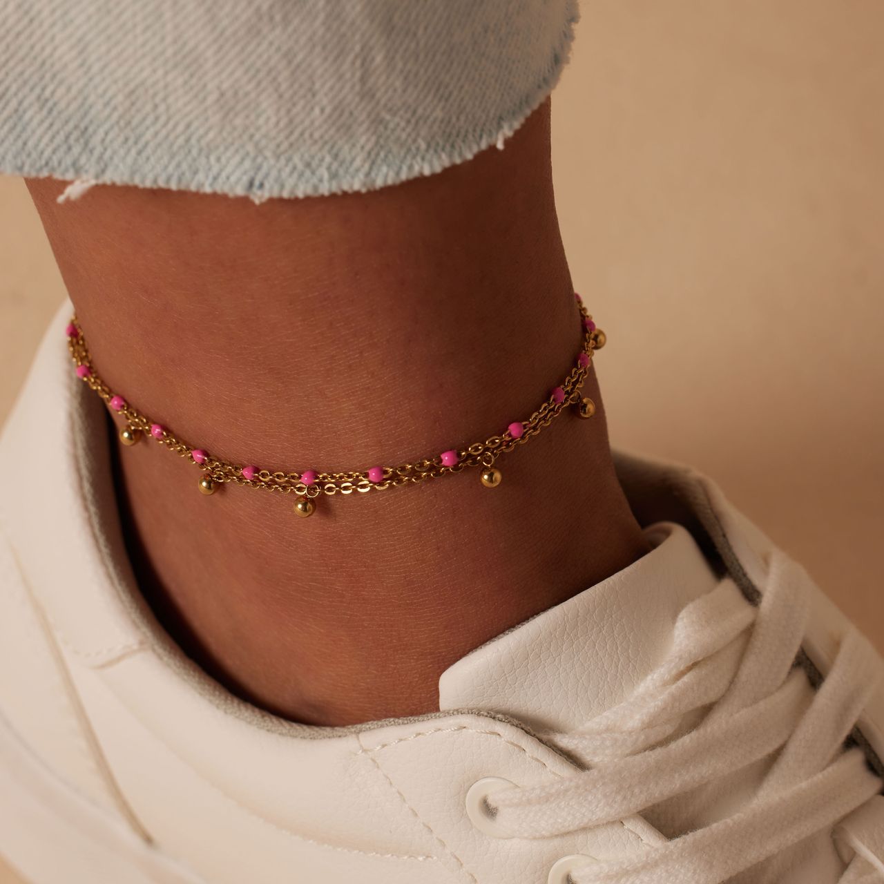 Dubbele goldplated stalen enkelband met bedeltjes