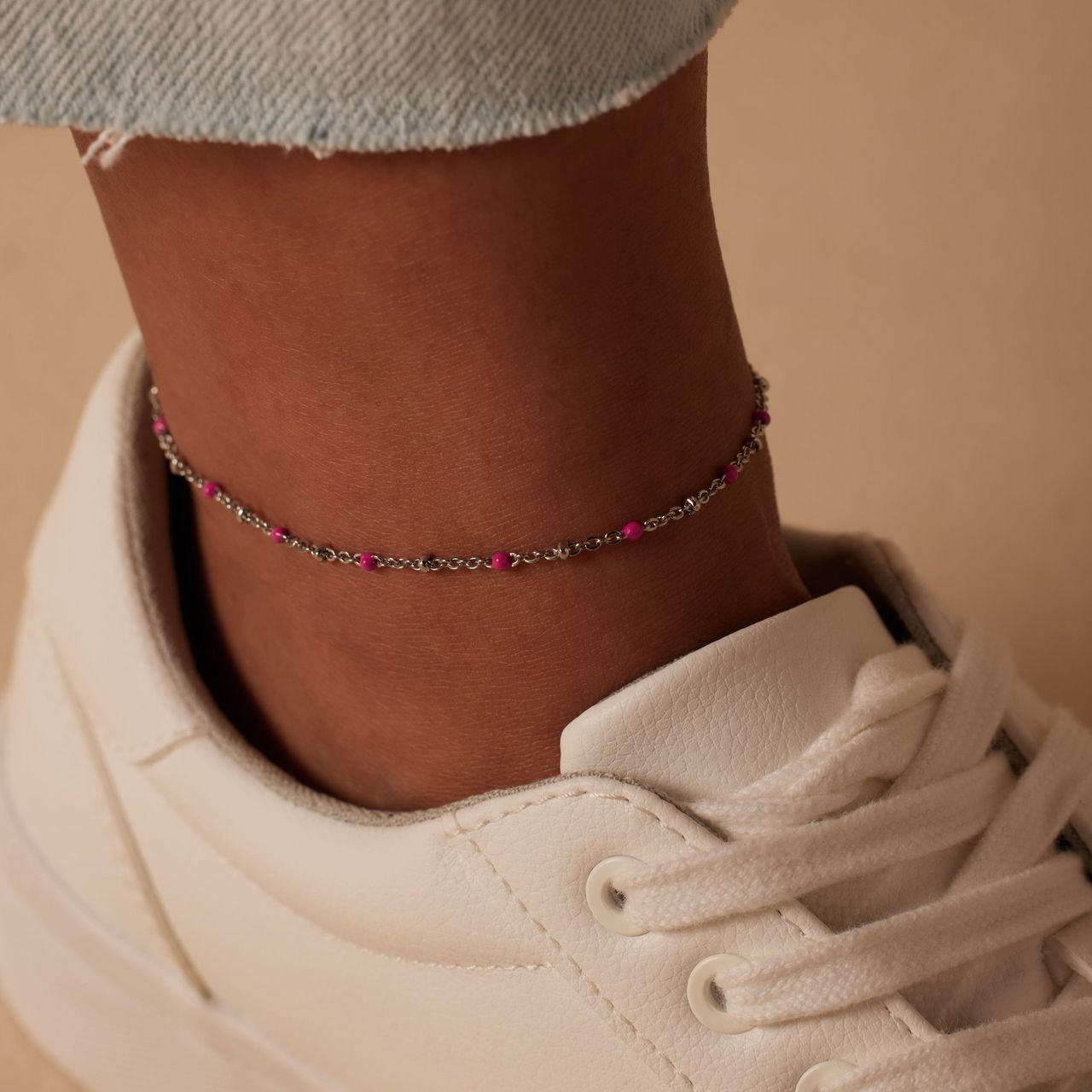 Gerecycled stalen enkelband saturn roze