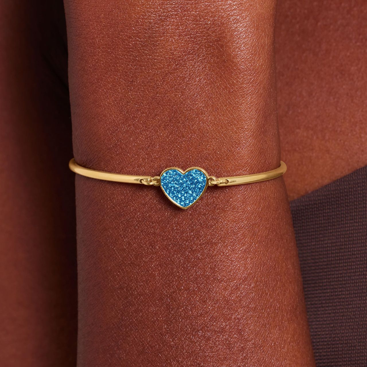 Stalen goldplated armband hart met kristal aqua