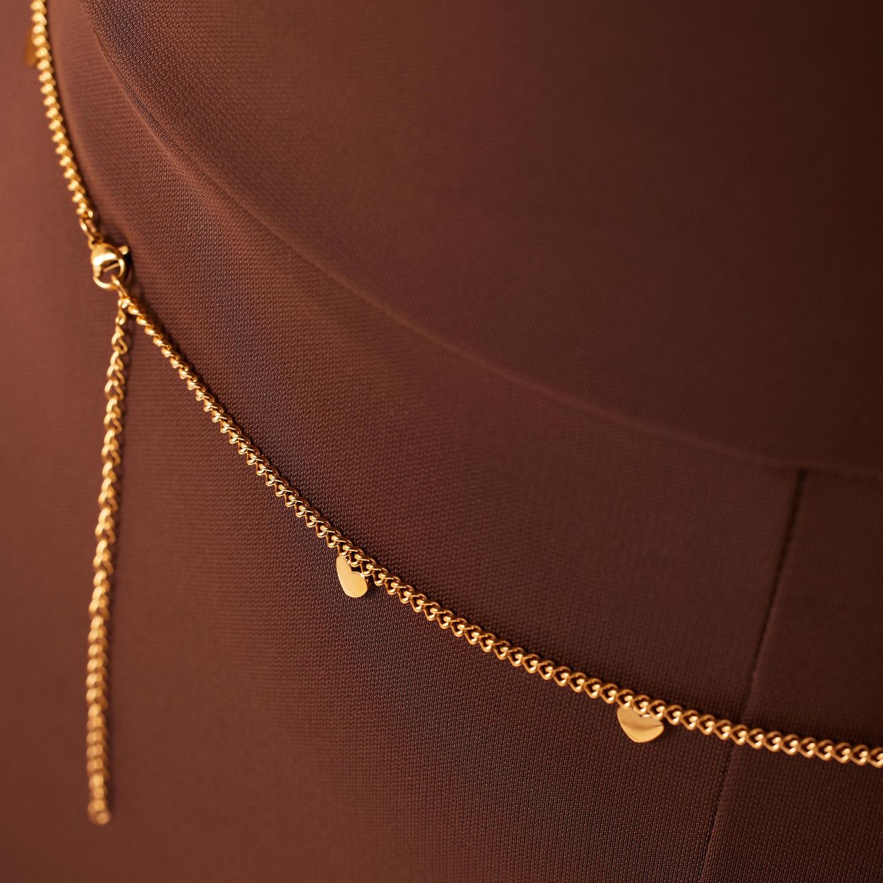 Stalen goldplated bodychain met hartjes