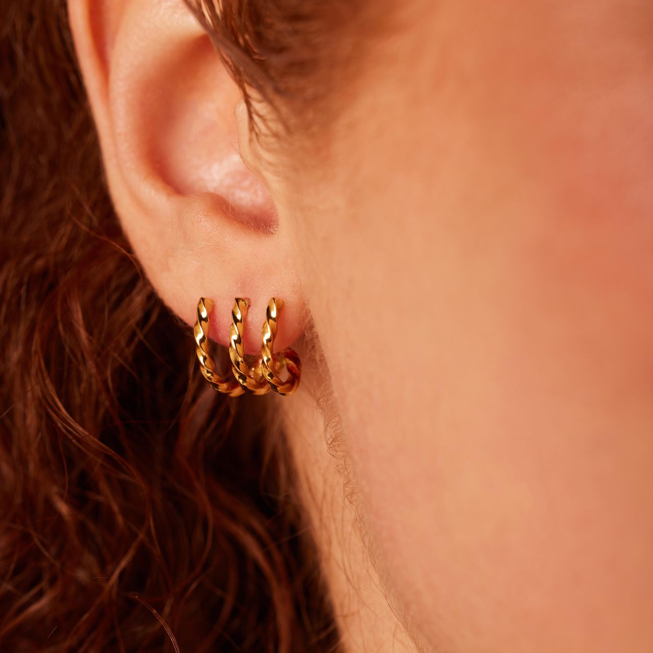 Stainless steel goldplated dubbele oorbellen gedraaid voor dames