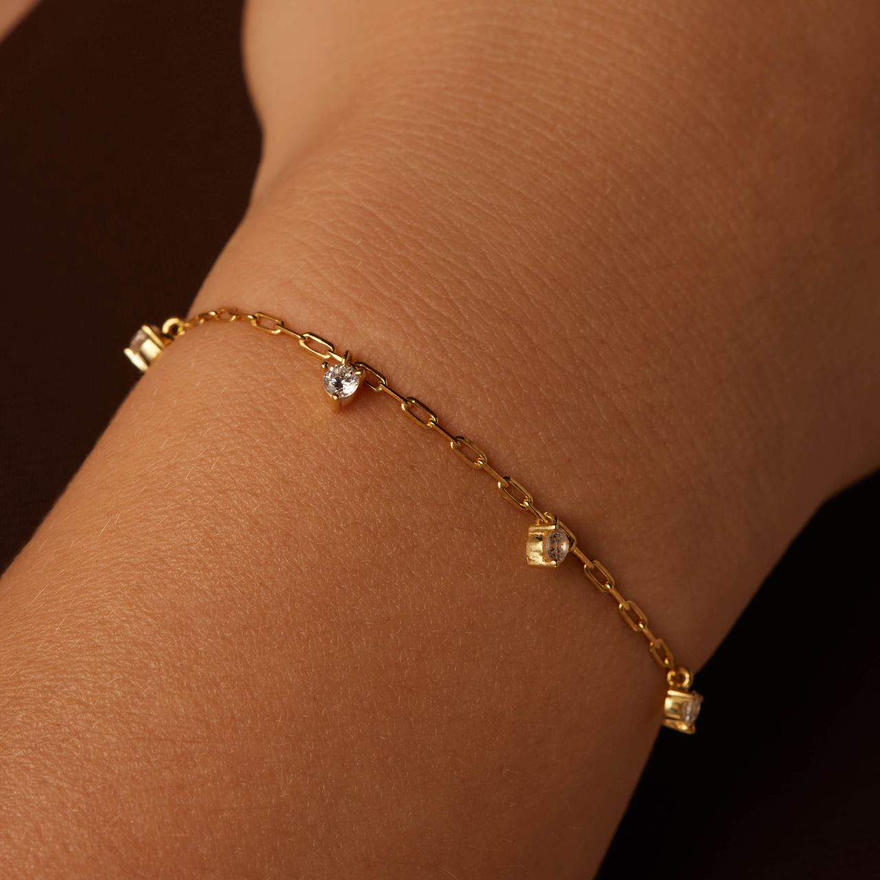 Zilveren goldplated bedelarmband met zirkonia voor dames