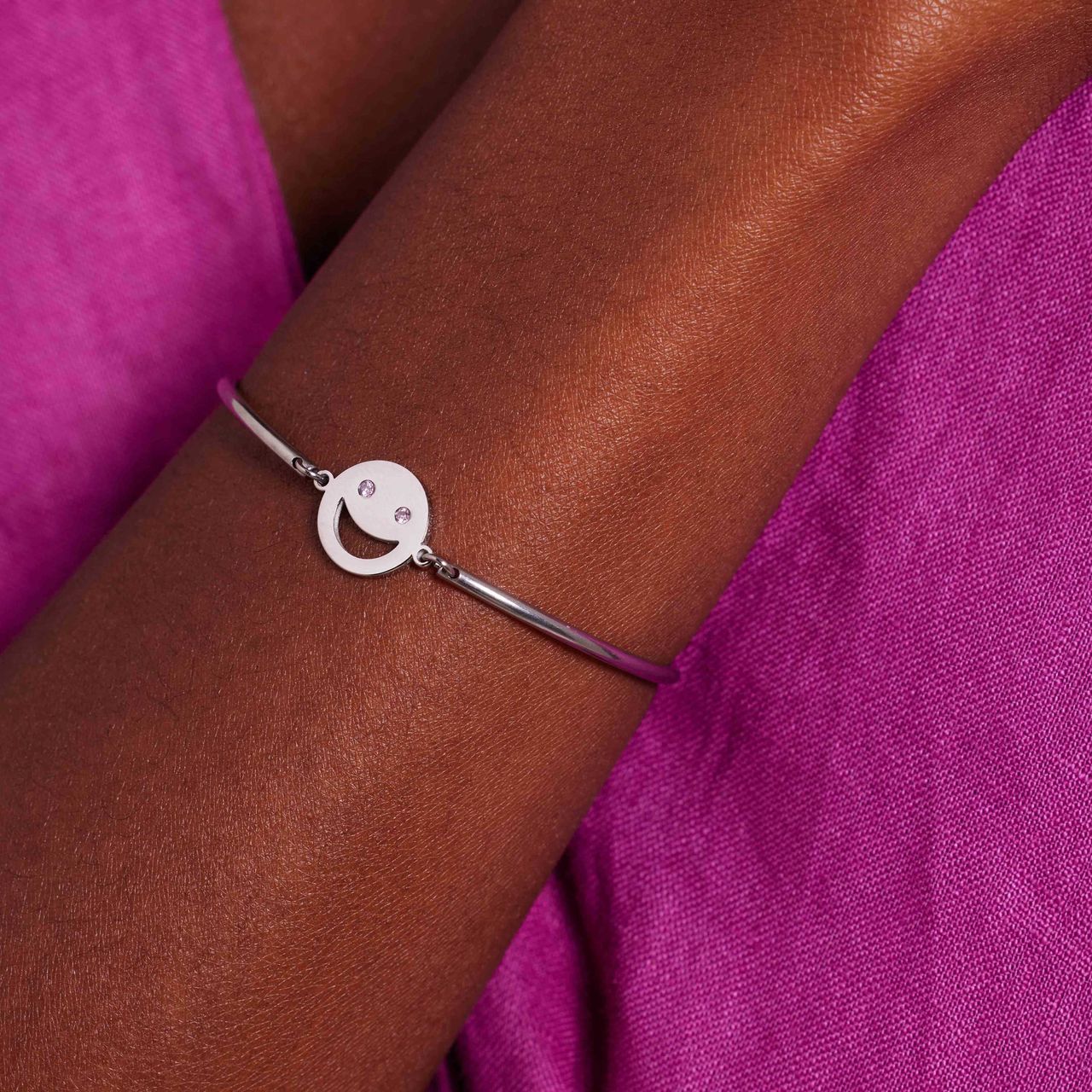 Stainless steel armband smiley met roze zirkonia