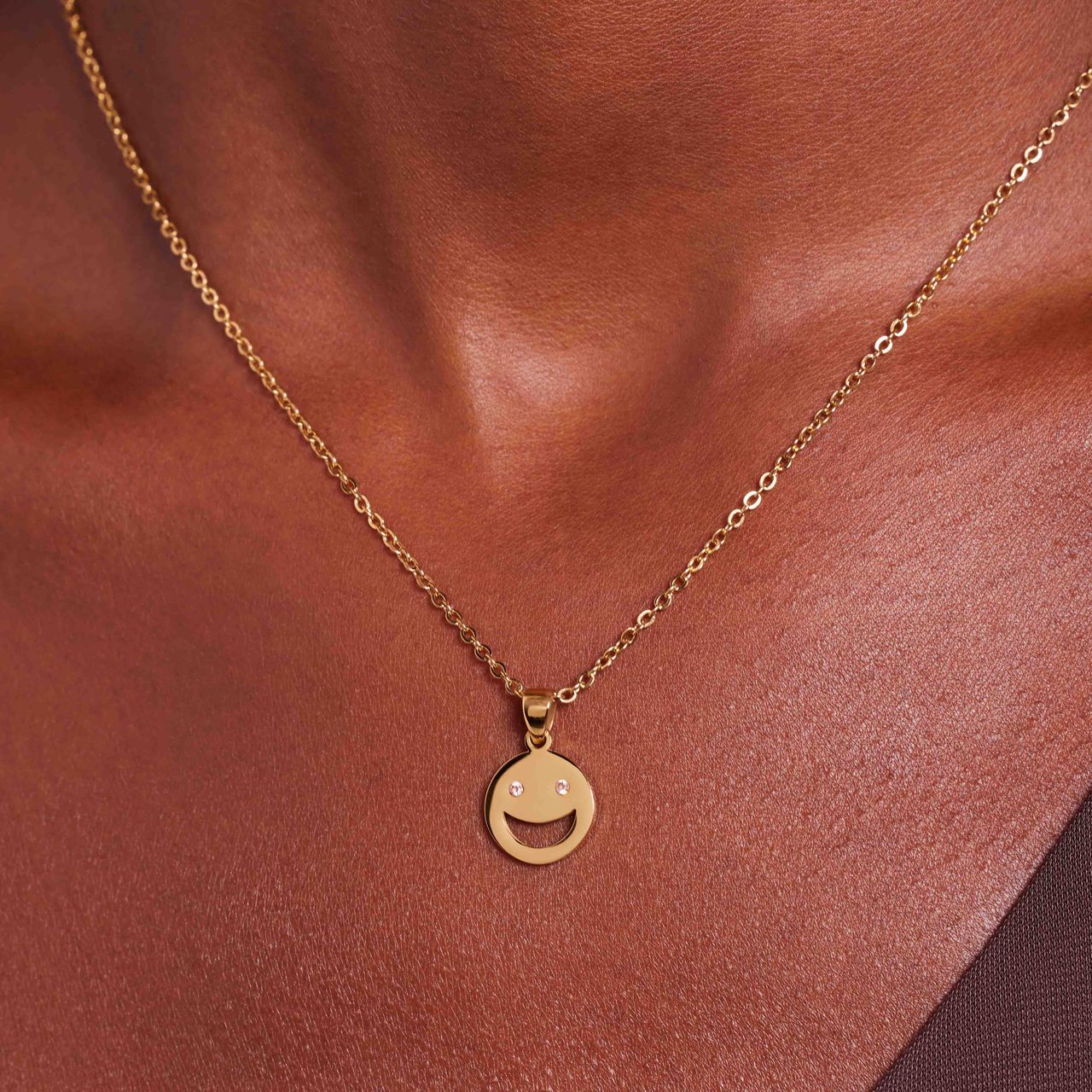 LivLiv stainless steel goldplated ketting smiley met roze zirkonia voor dames