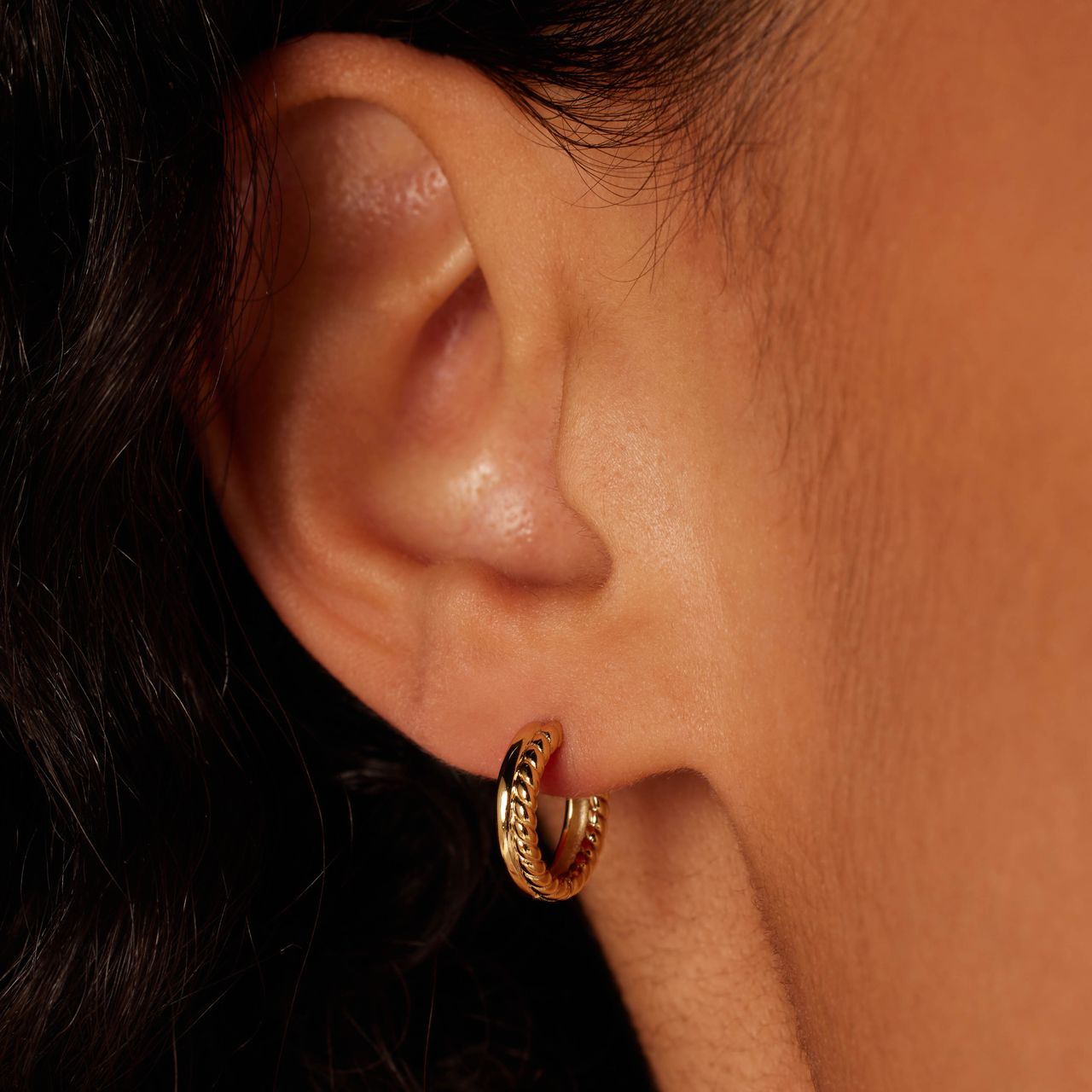 Zilveren goldplated oorringen met twist voor dames